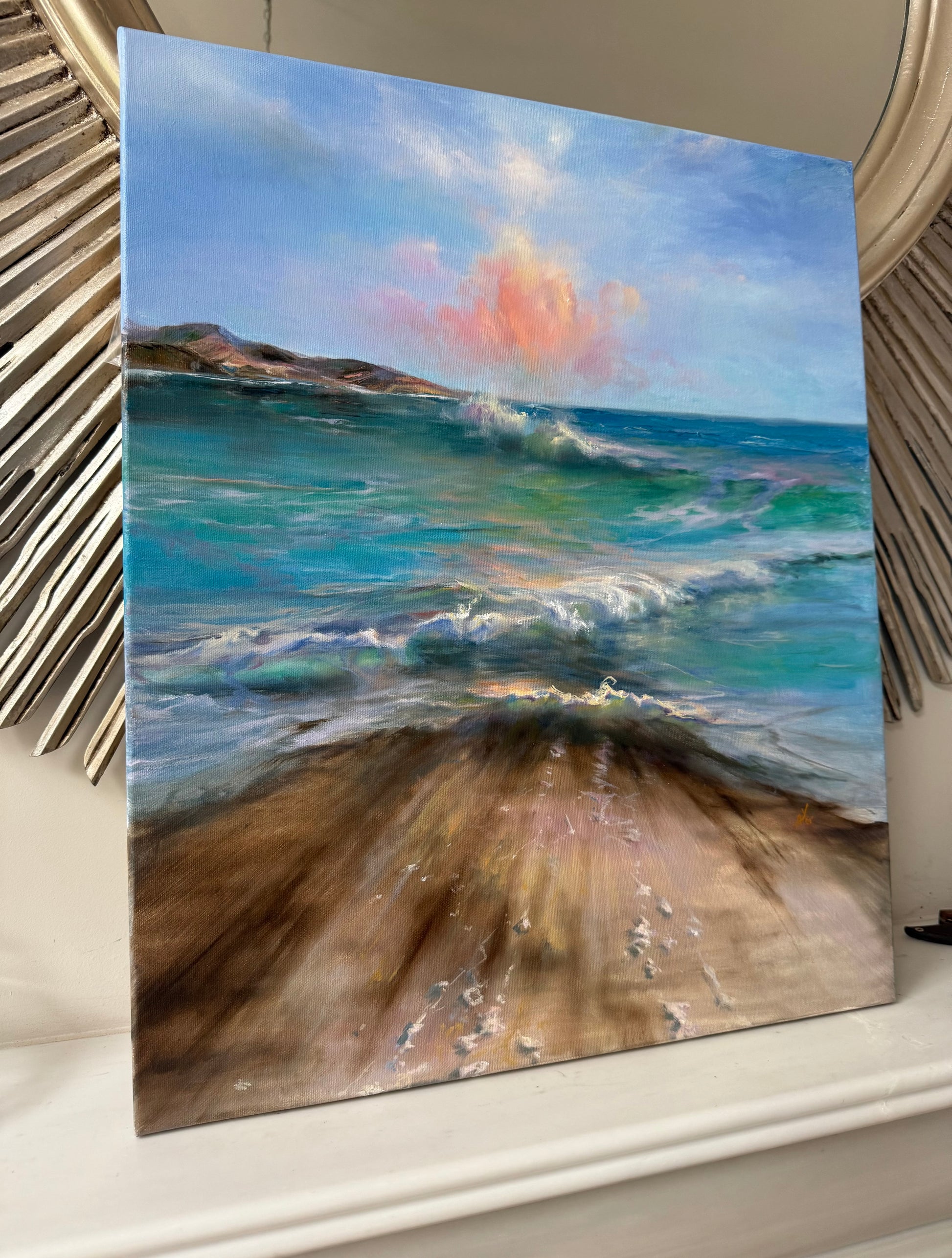 Sunset cloud over rolling waves