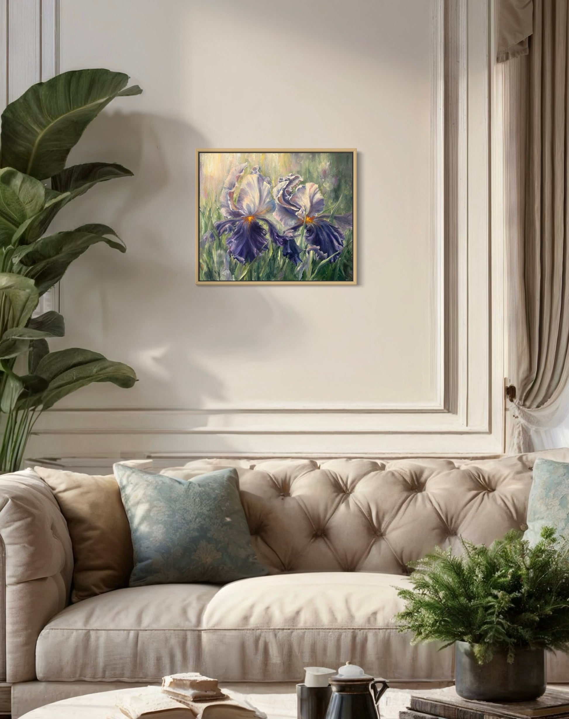 Botanical painting featuring white and purple irises, hanging above the beige sofa.
