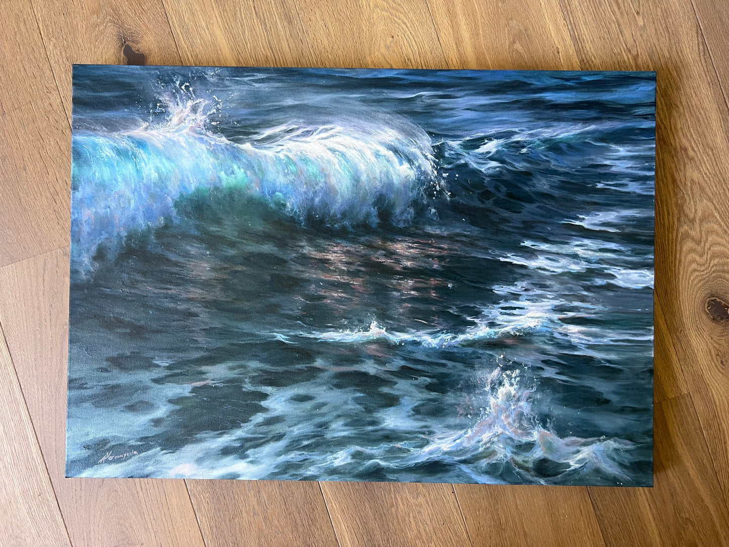 glowing wave, crushing into the shore