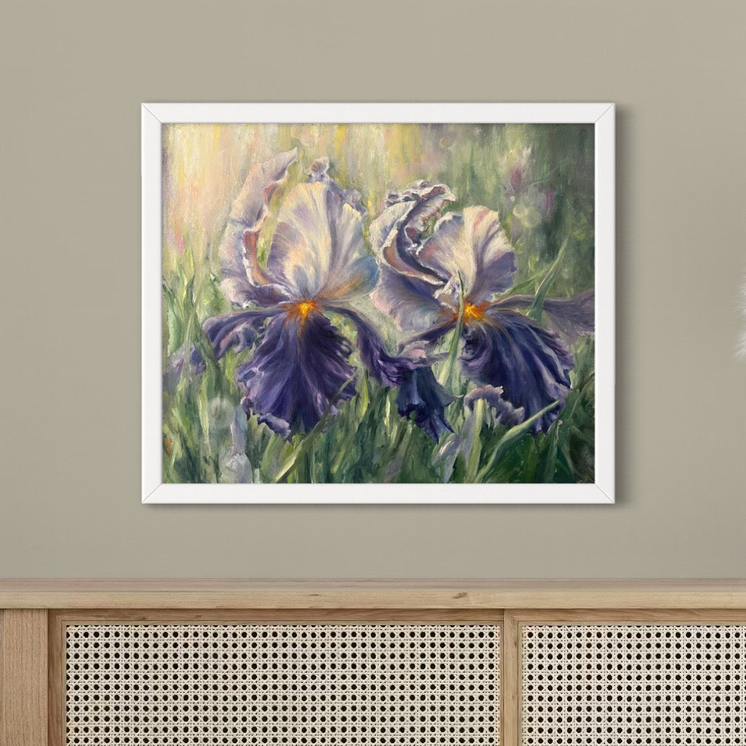 Framed white flowers oil painting hanging above the side table.