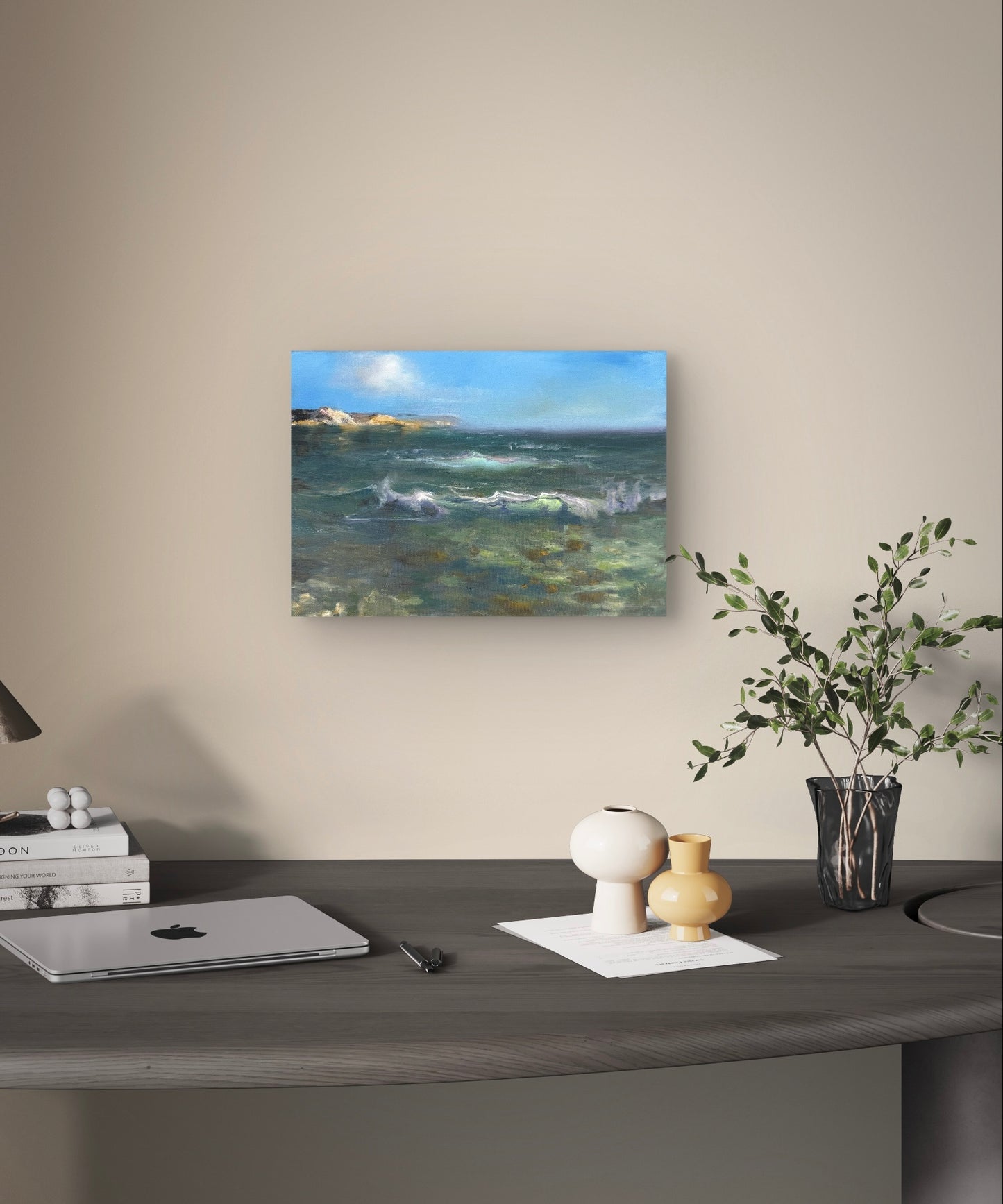 Seascape hanging above the desk.