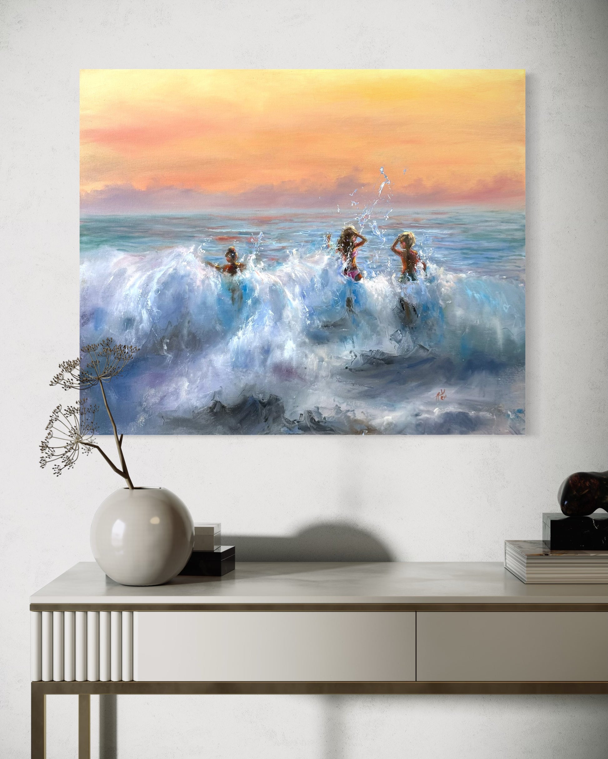 Sunset oil painting hanging above the side table.