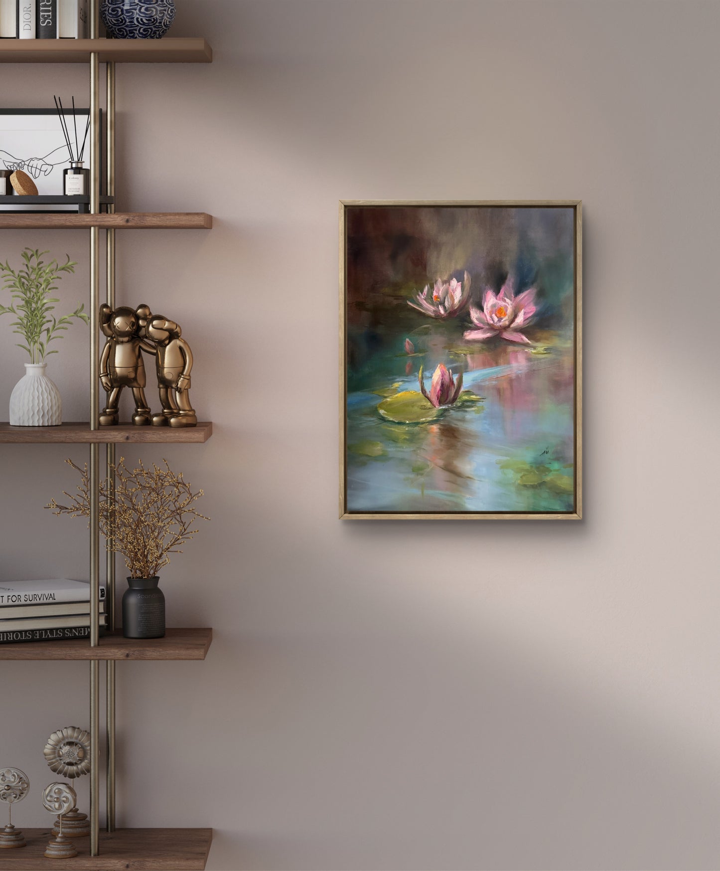 Framed oil painting of pink water lilies on a wall near a wooden shelf with decorative items.