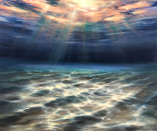 Sunshine piercing seawater, underwater sun rays shimmering on the sea floor.