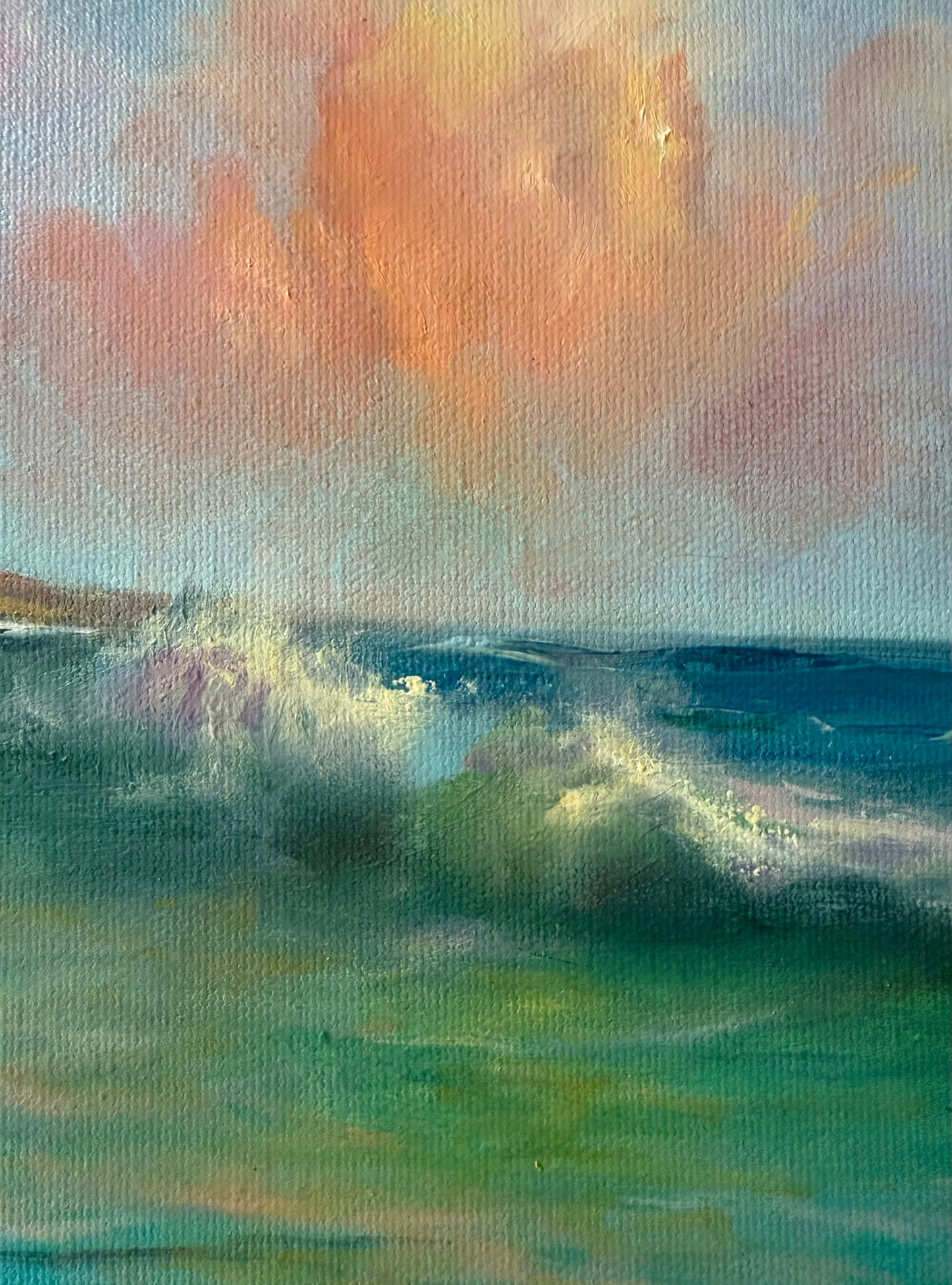 Green wave at the distance and glowing cloud above