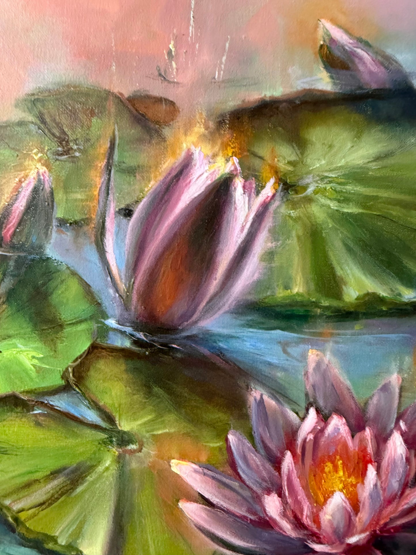Close up of a Painting of water lilies with green leaves and pink flowers. 