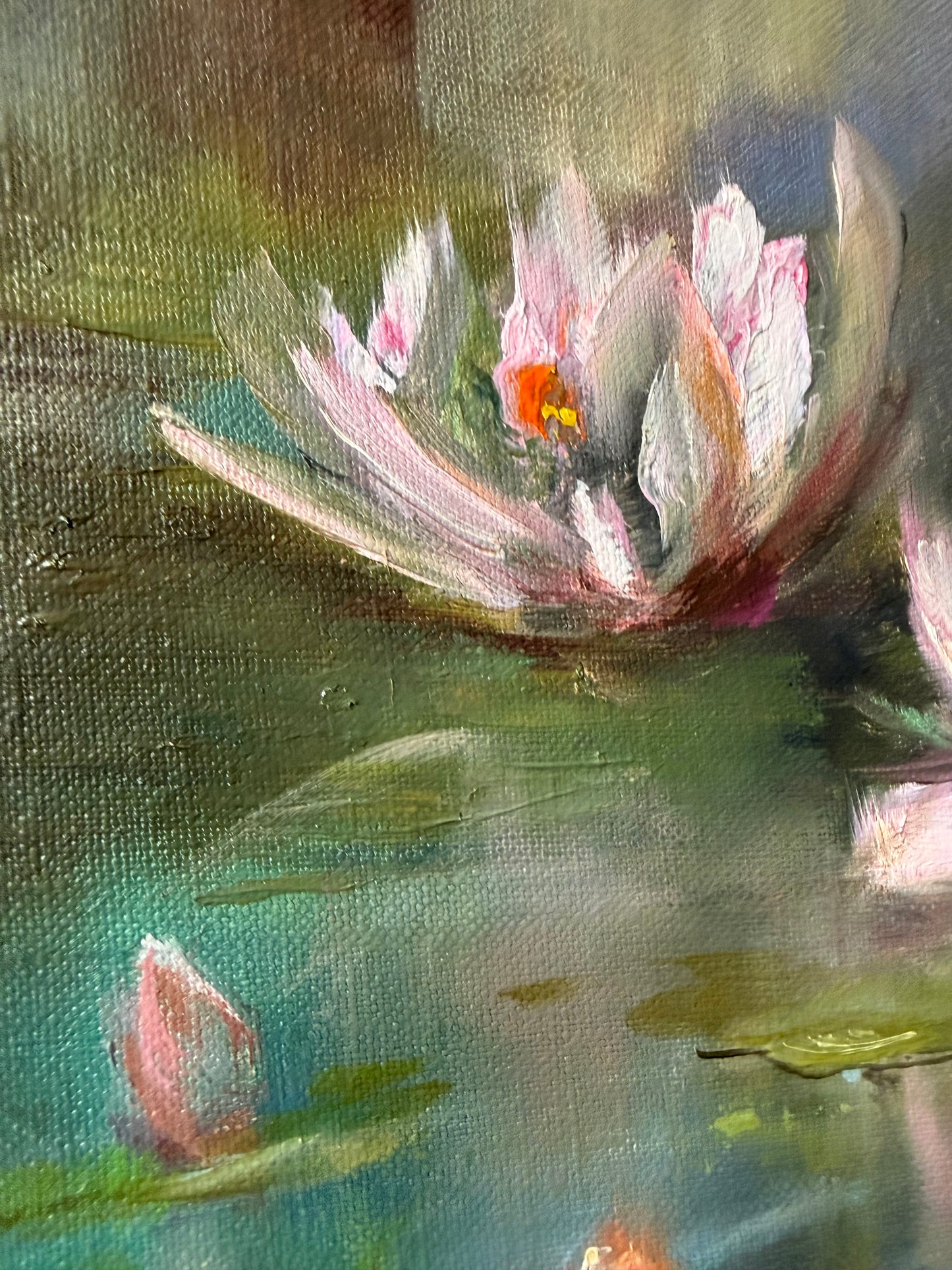 Close up of an Oil painting of water lilies with a focus on a pink flower and reflections on pond water surface.