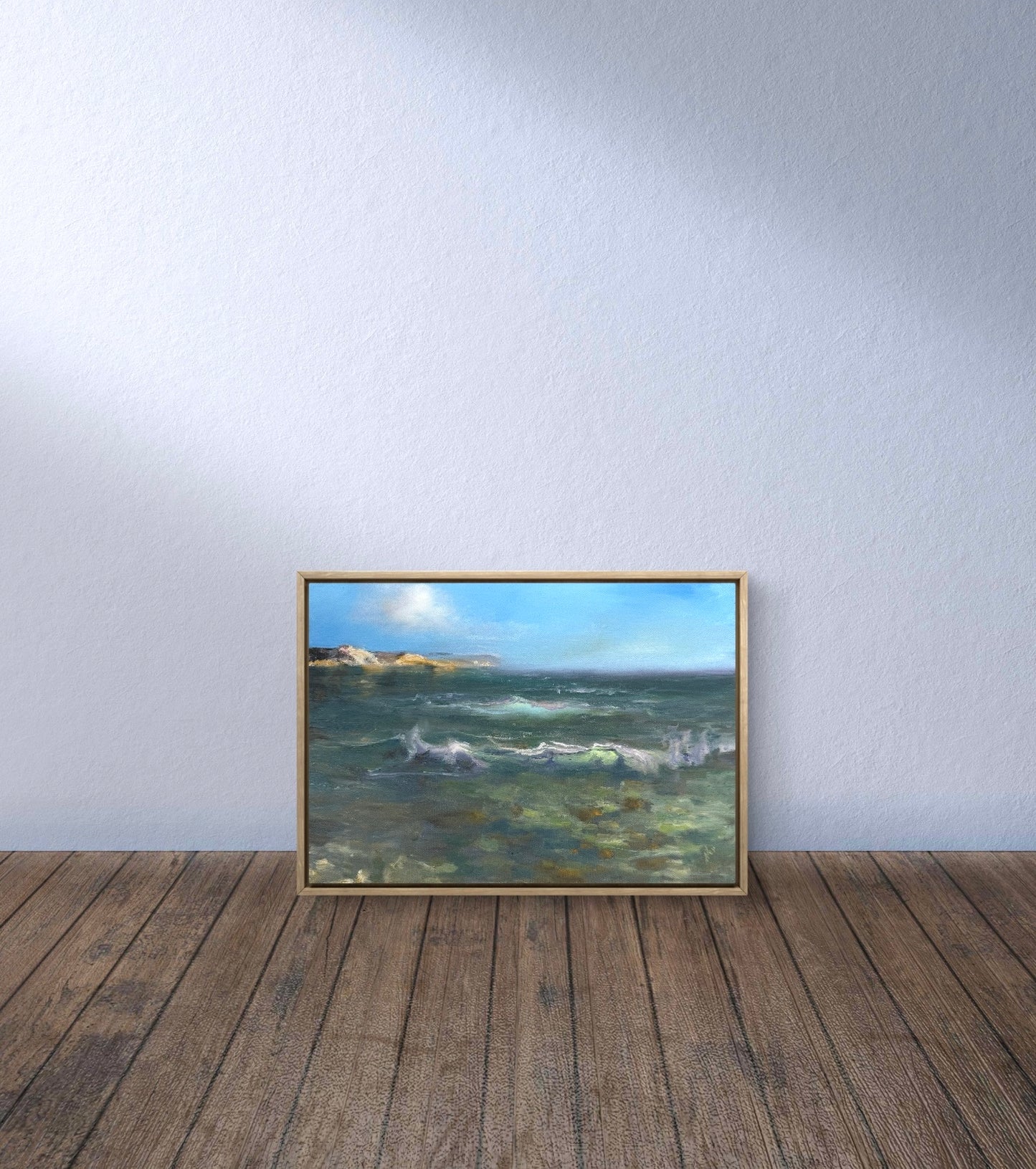 Sea oil painting, framed, featuring clear water, lazy rolling waves, stony sea bottom.