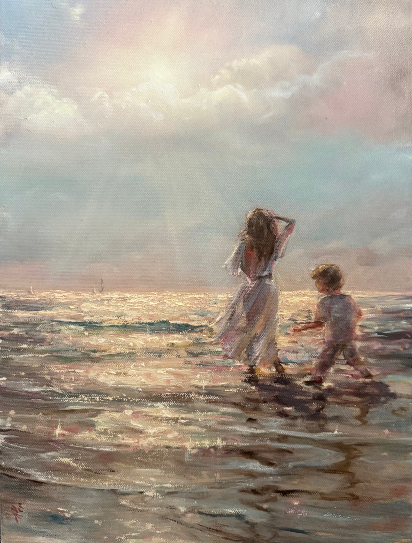 seascape featuring a girl and a boy at sunset beach.