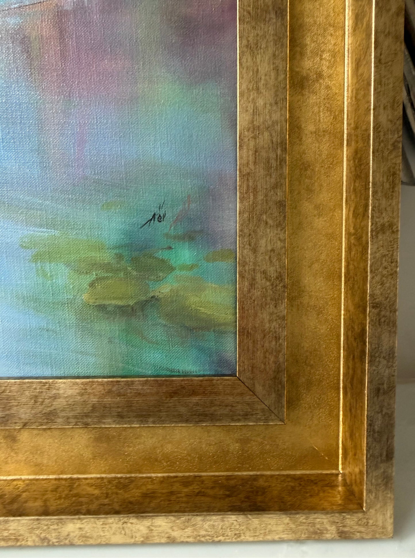 Framed lily painting with a gold border