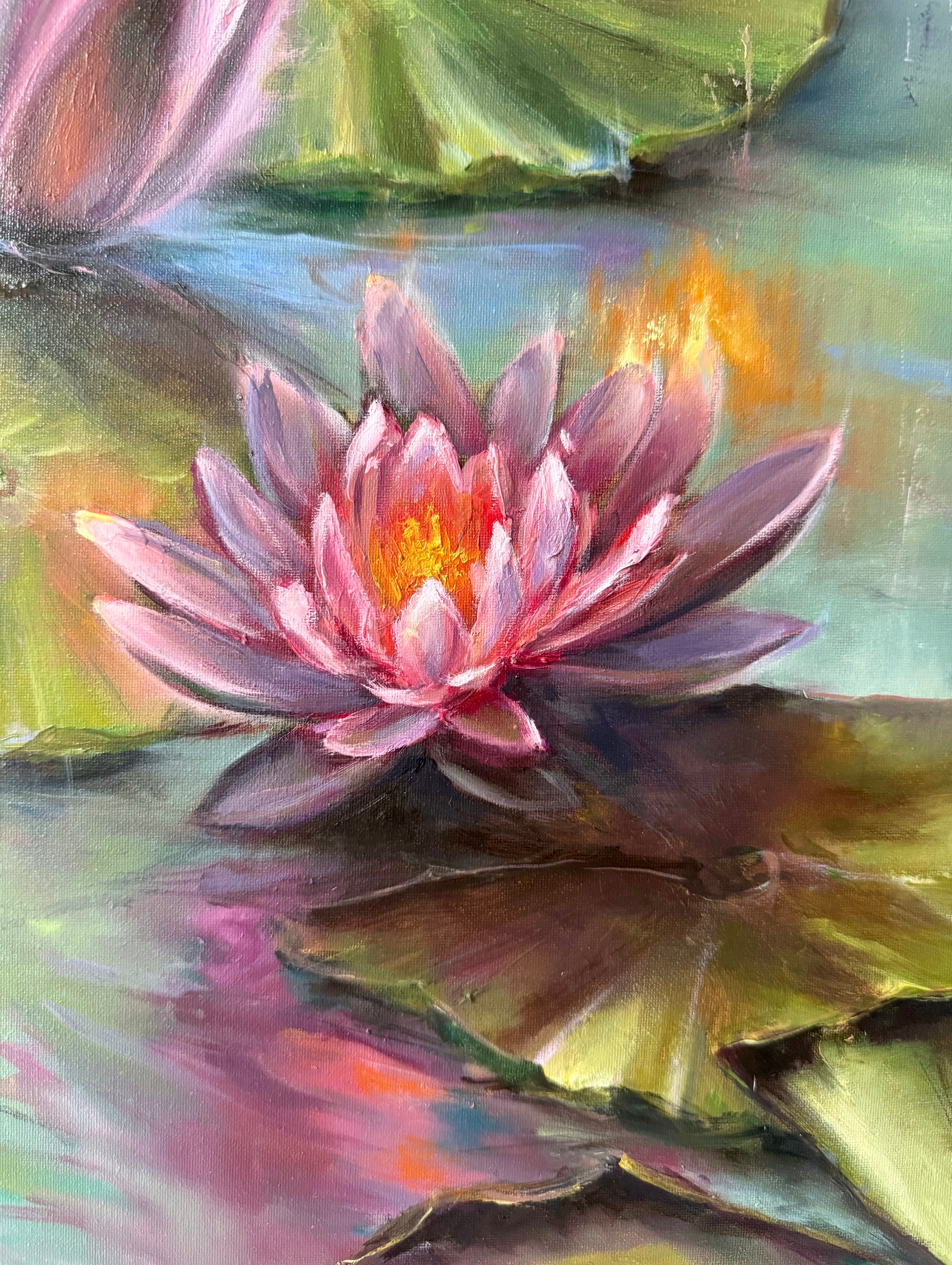 Oil painting of a pink water lily with green leaves and ripples on water of a lily pond. Bright colours of the oil painting symbolise new beginnings. 