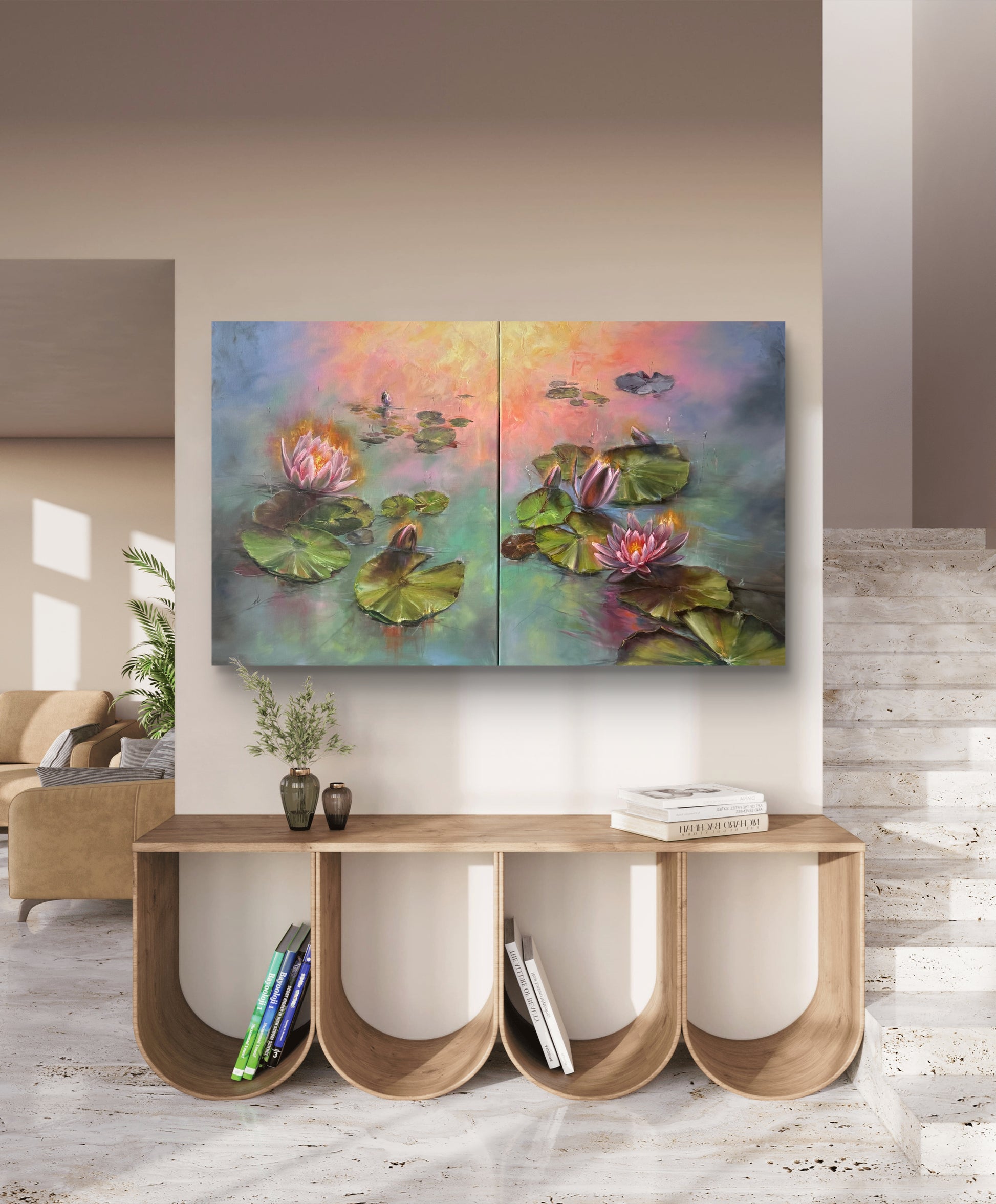 Diptych painting of water lilies at sunrise with a colourful sunlight reflections at background on a wall above a wooden console table.